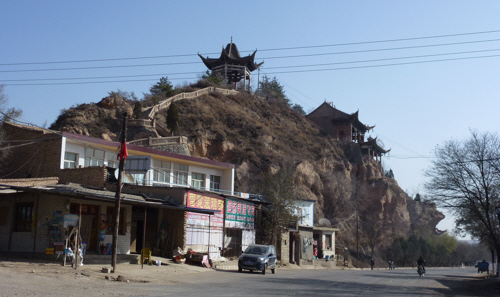 Temples perched over villages along our route